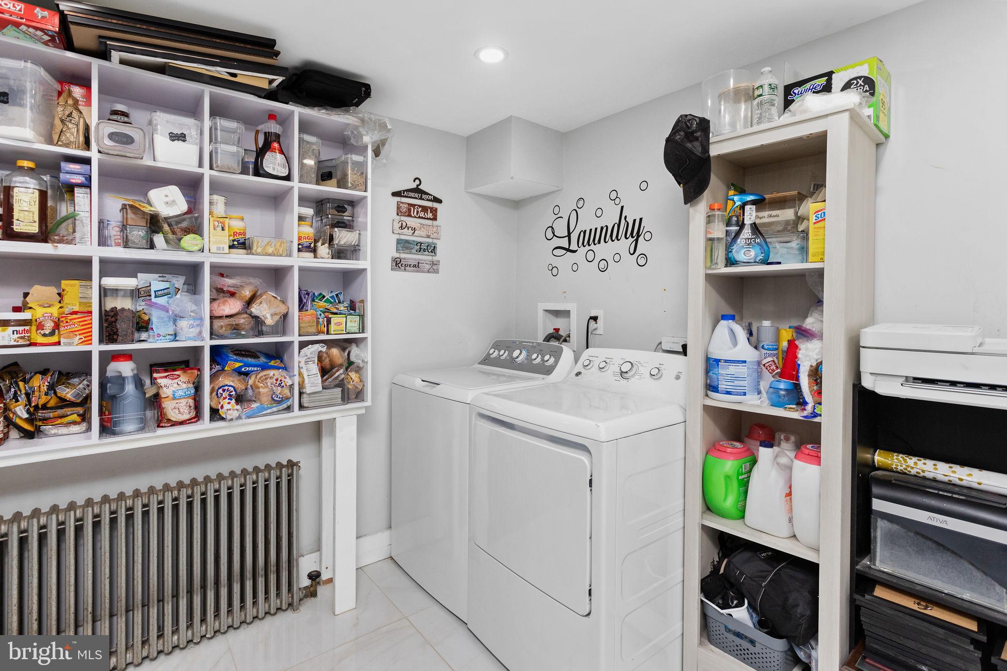 11 Main Street Englishtown, NJ 07726 - Photo 10 of 29 a utility room with fridge dryer and baby on a shelf