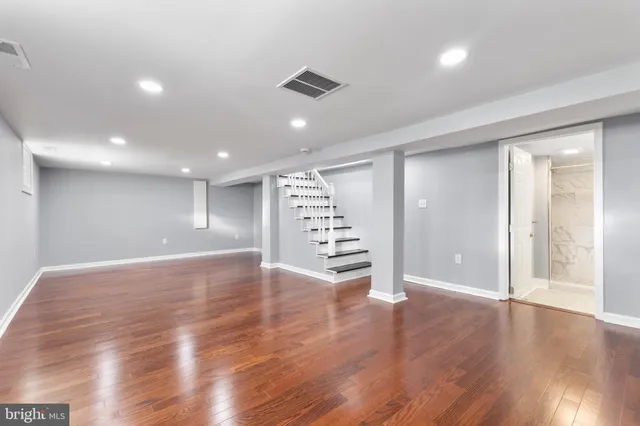 a view of a big room with wooden floors