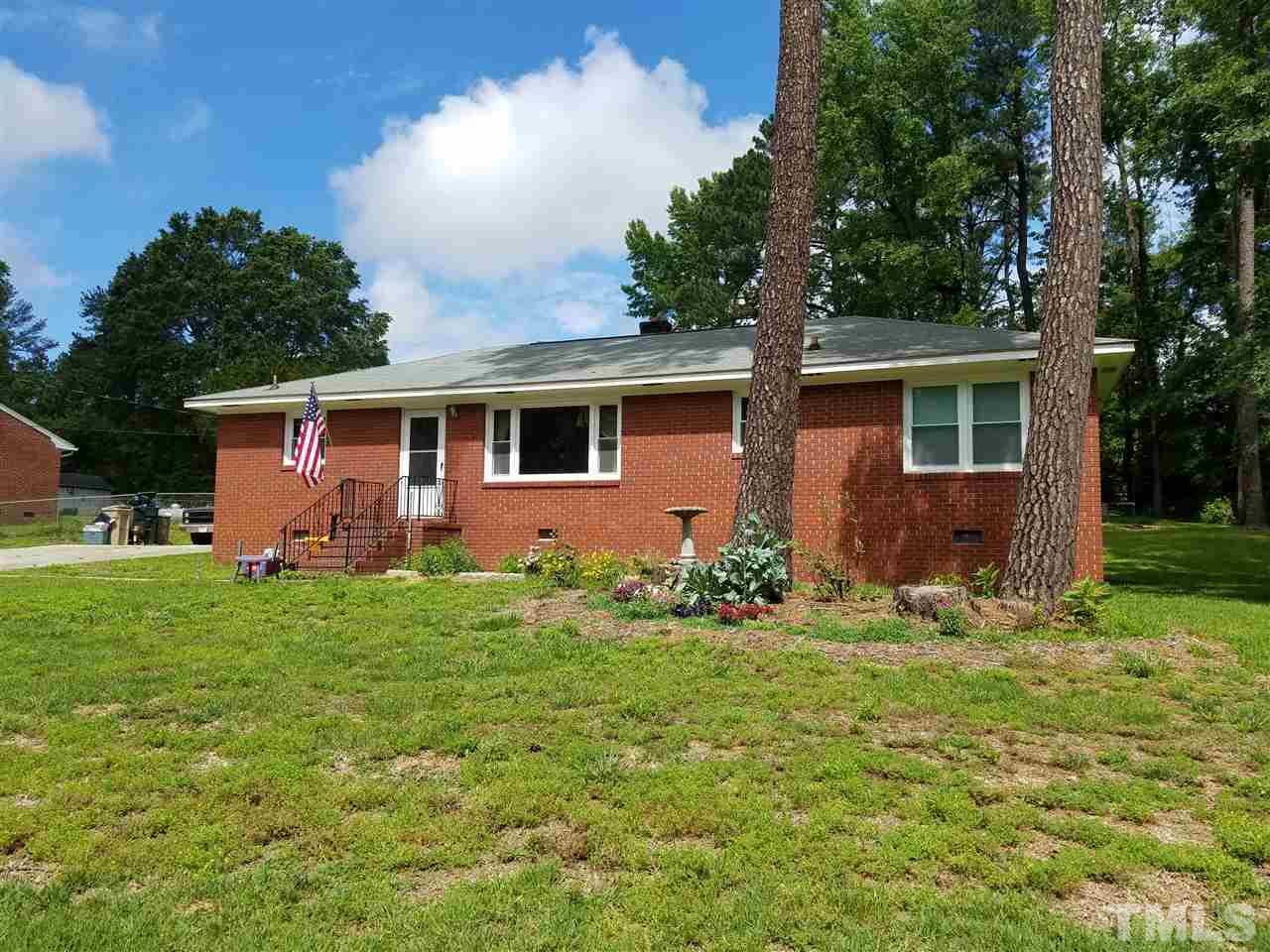 3616 Woodside Road Garner, NC 27529 - Photo 1 of 11 a front view of house with yard and green space
