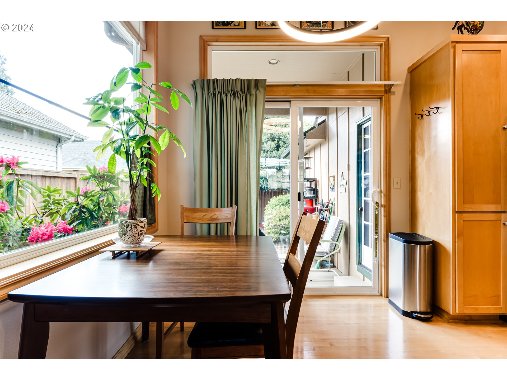 1547 Canal Street Springfield, OR 97477 - Photo 12 of 37 a dining room with furniture and wooden floor