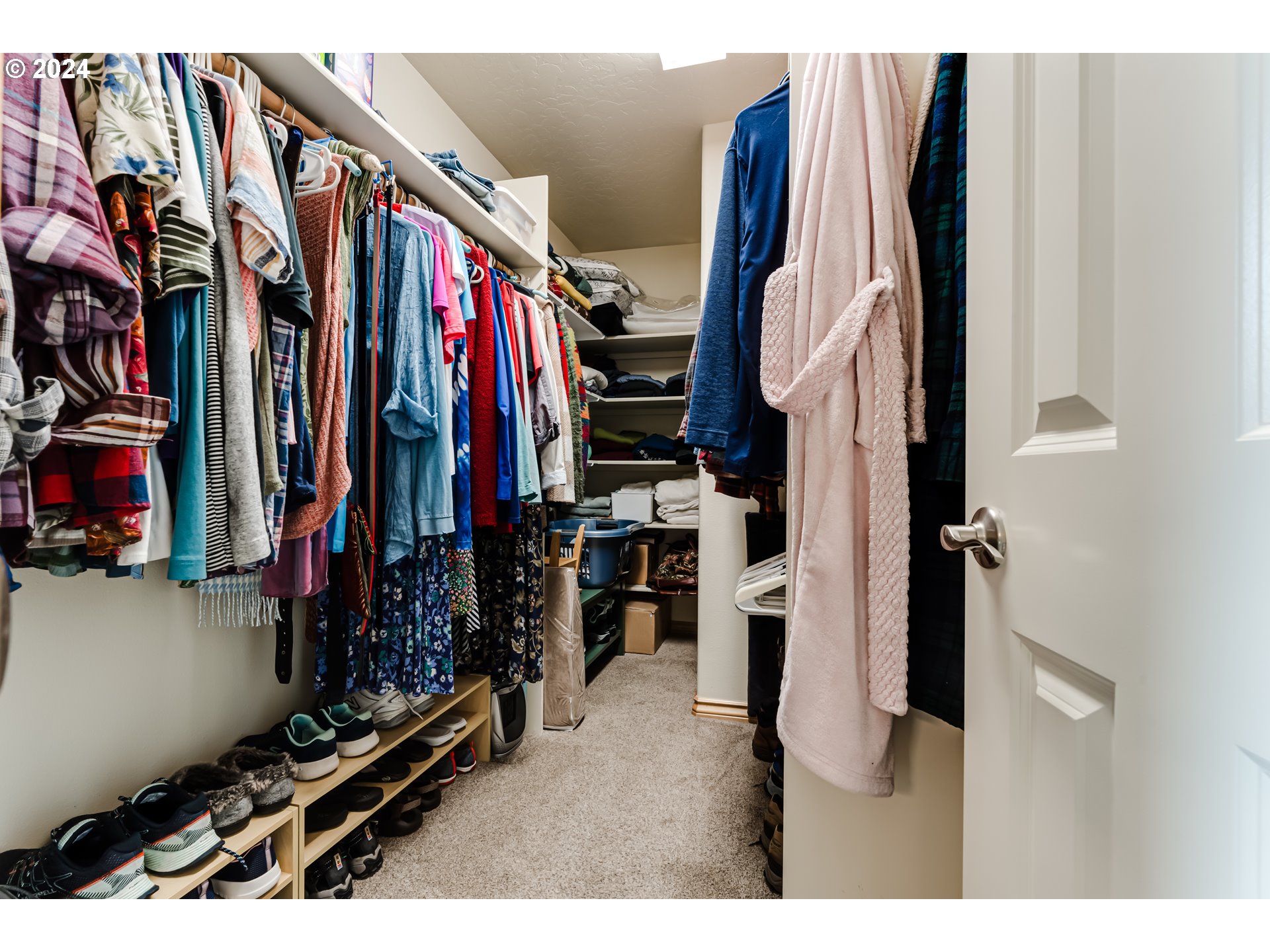 1547 Canal Street Springfield, OR 97477 - Photo 25 of 37 a view of walk in closet with clothes and shoes