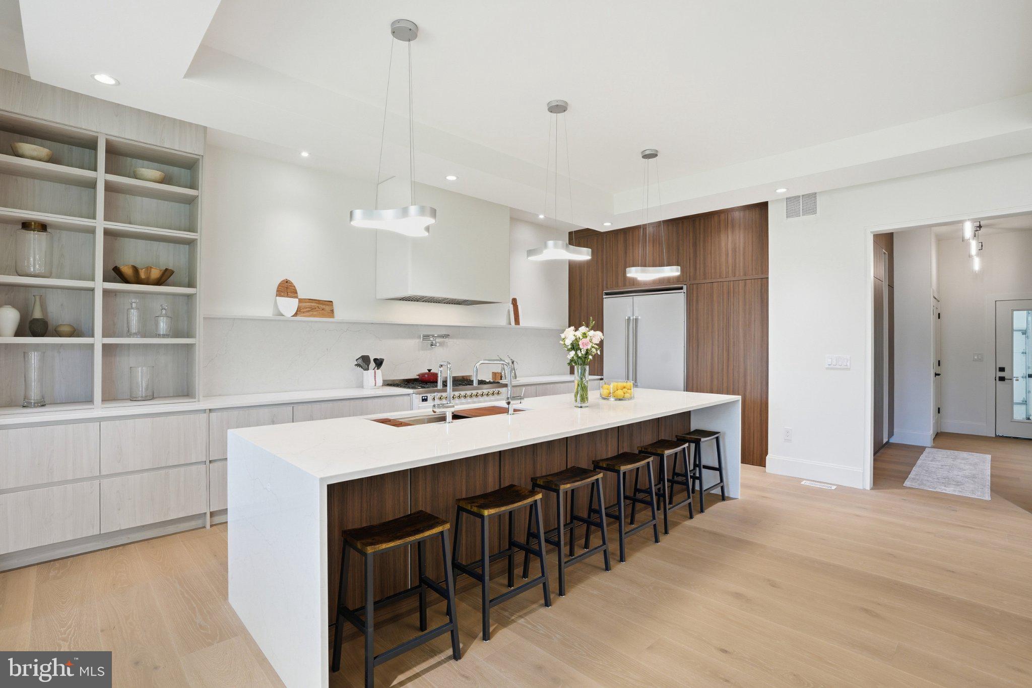 7421 Magarity Road Falls Church, VA 22043 - Photo 25 of 66 Sleek modern kitchen with elegant design.