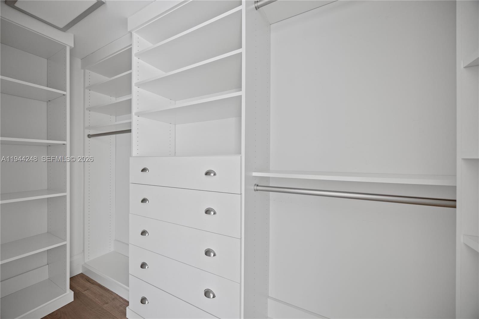 2530 Northeast 48th Street Lighthouse Point, FL 33064 - Photo 12 of 23 a view of an empty walk in closet