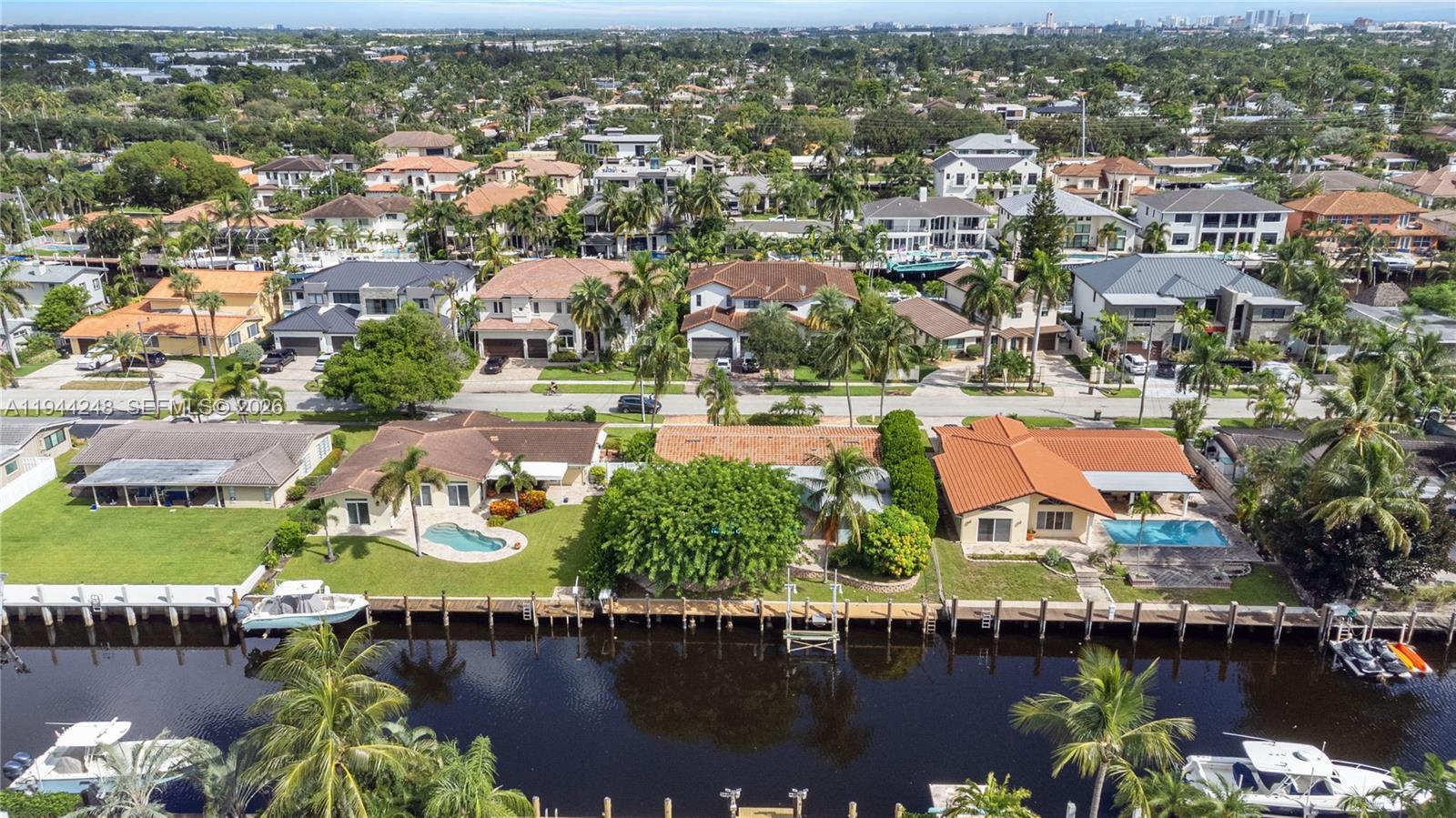 2530 Northeast 48th Street Lighthouse Point, FL 33064 - Photo 23 of 23 an aerial view of residential houses with outdoor space and lake view