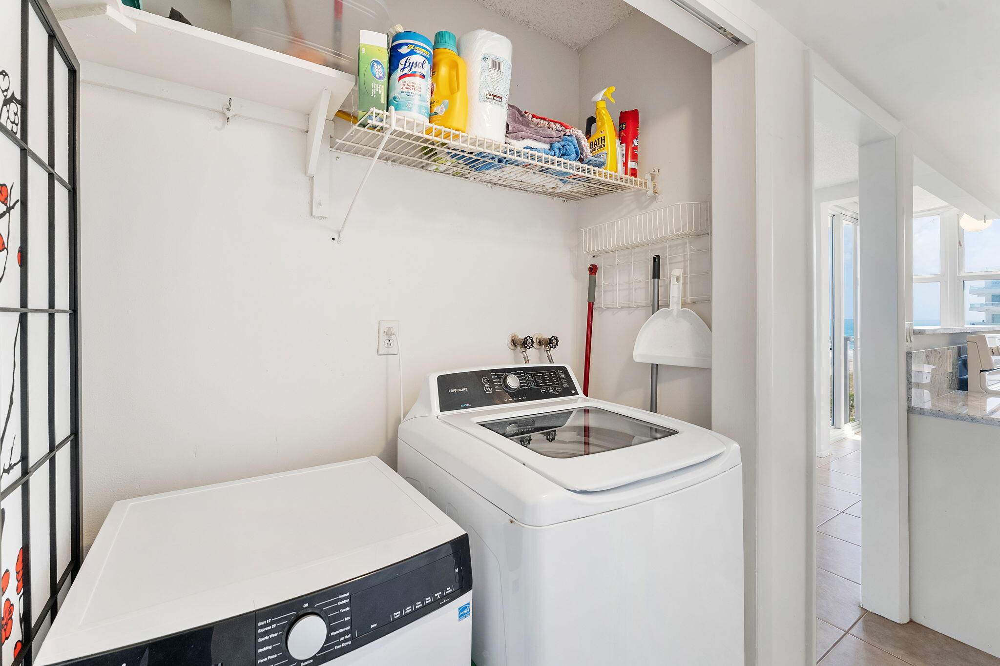 2000 South Ocean Boulevard, Unit 10H Boca Raton, FL 33432 - Photo 28 of 54 a utility room with dryer and washer