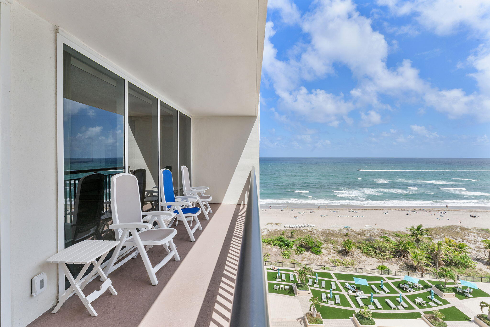 2000 South Ocean Boulevard, Unit 10H Boca Raton, FL 33432 - Photo 3 of 54 a view of a balcony with chair and table