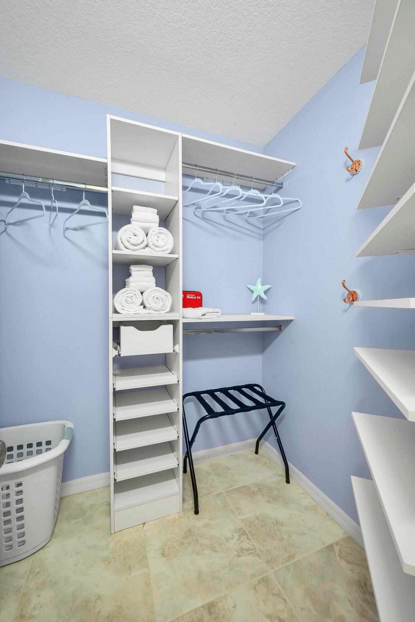 5464 Northwest Milner Drive Port St. Lucie, FL 34983 - Photo 28 of 49 a view of a room with shelves