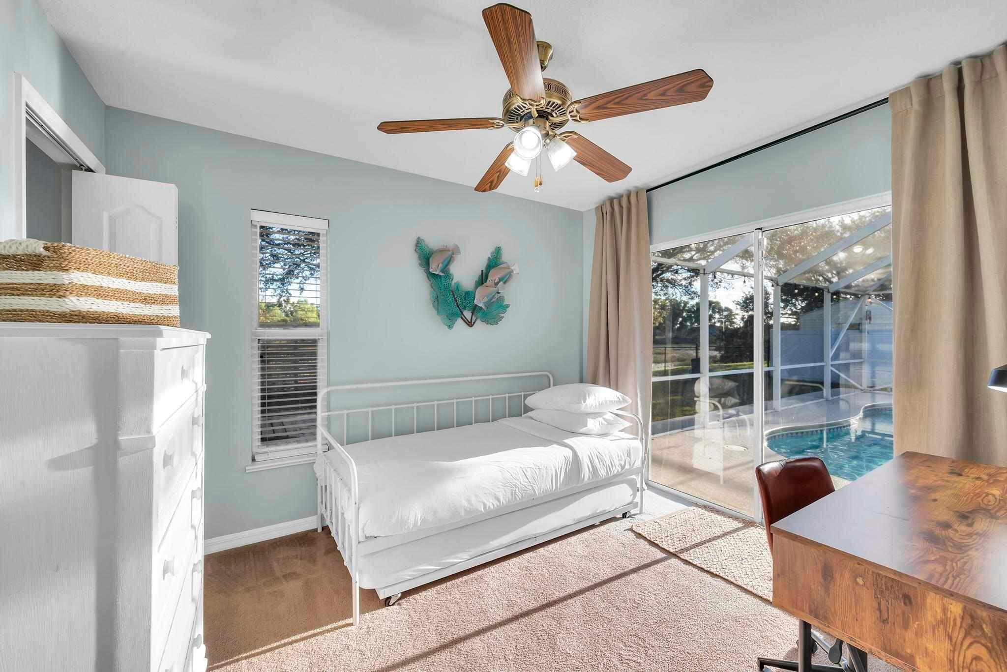 5464 Northwest Milner Drive Port St. Lucie, FL 34983 - Photo 33 of 49 a living room with furniture and a window