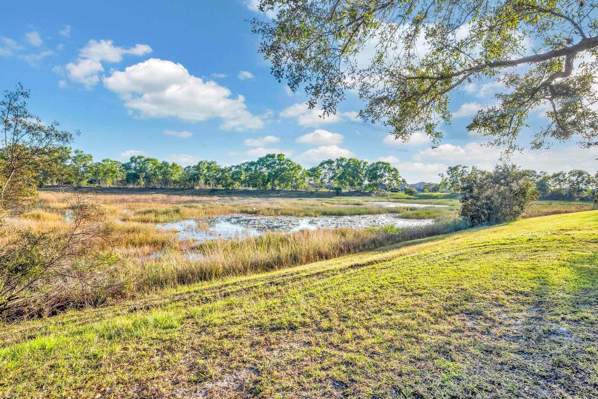 5464 Northwest Milner Drive Port St. Lucie, FL 34983 - Photo 49 of 49 a view of an ocean and a mountain