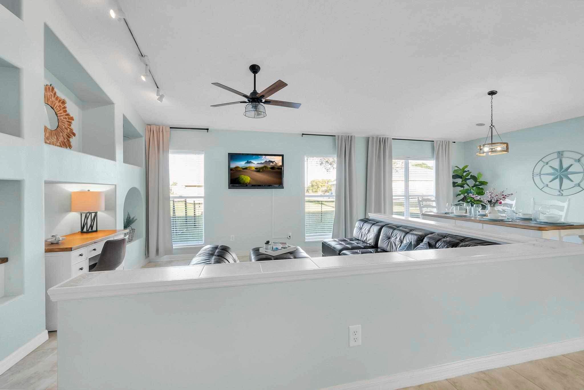 5464 Northwest Milner Drive Port St. Lucie, FL 34983 - Photo 10 of 49 a view of a living room and a kitchen