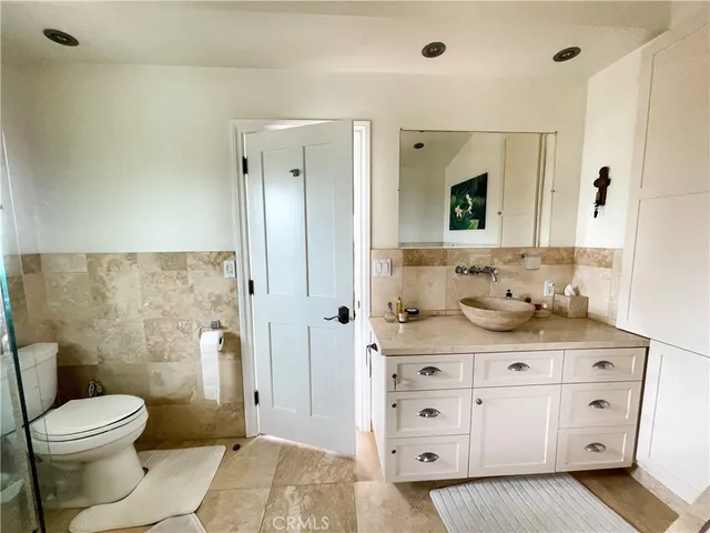 a view of a room with furniture and window