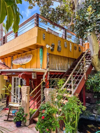 a view of a pathway with a tree