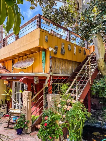 a view of a pathway with a tree