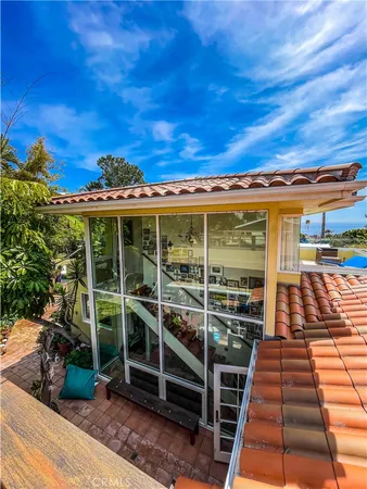 a view of a backyard with sitting area