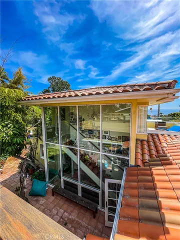 a view of a backyard with sitting area
