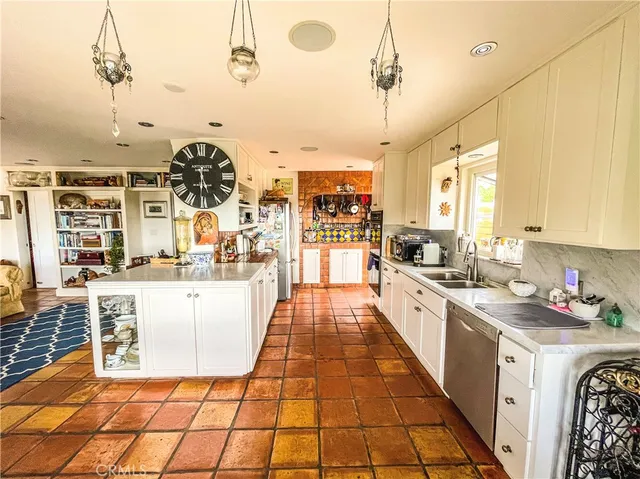 a large kitchen with cabinets