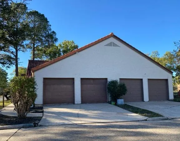a front view of house with garage