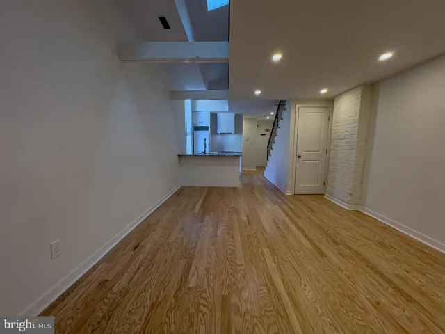 a kitchen with a stove and a microwave