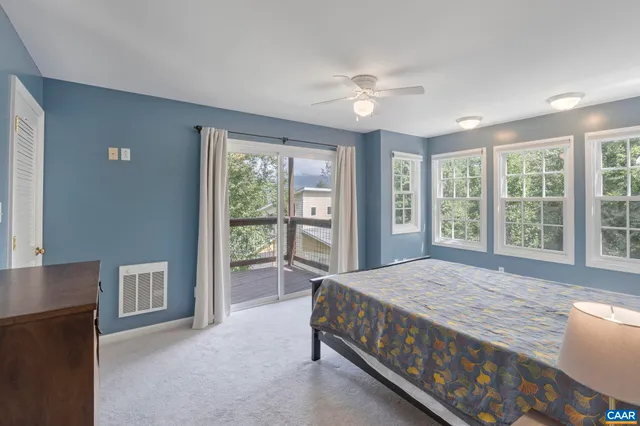 a view of a house with yard and plants