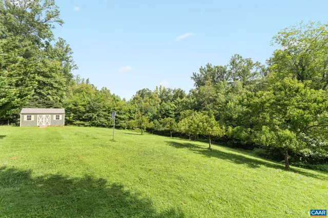 a view of balcony with wooden floor