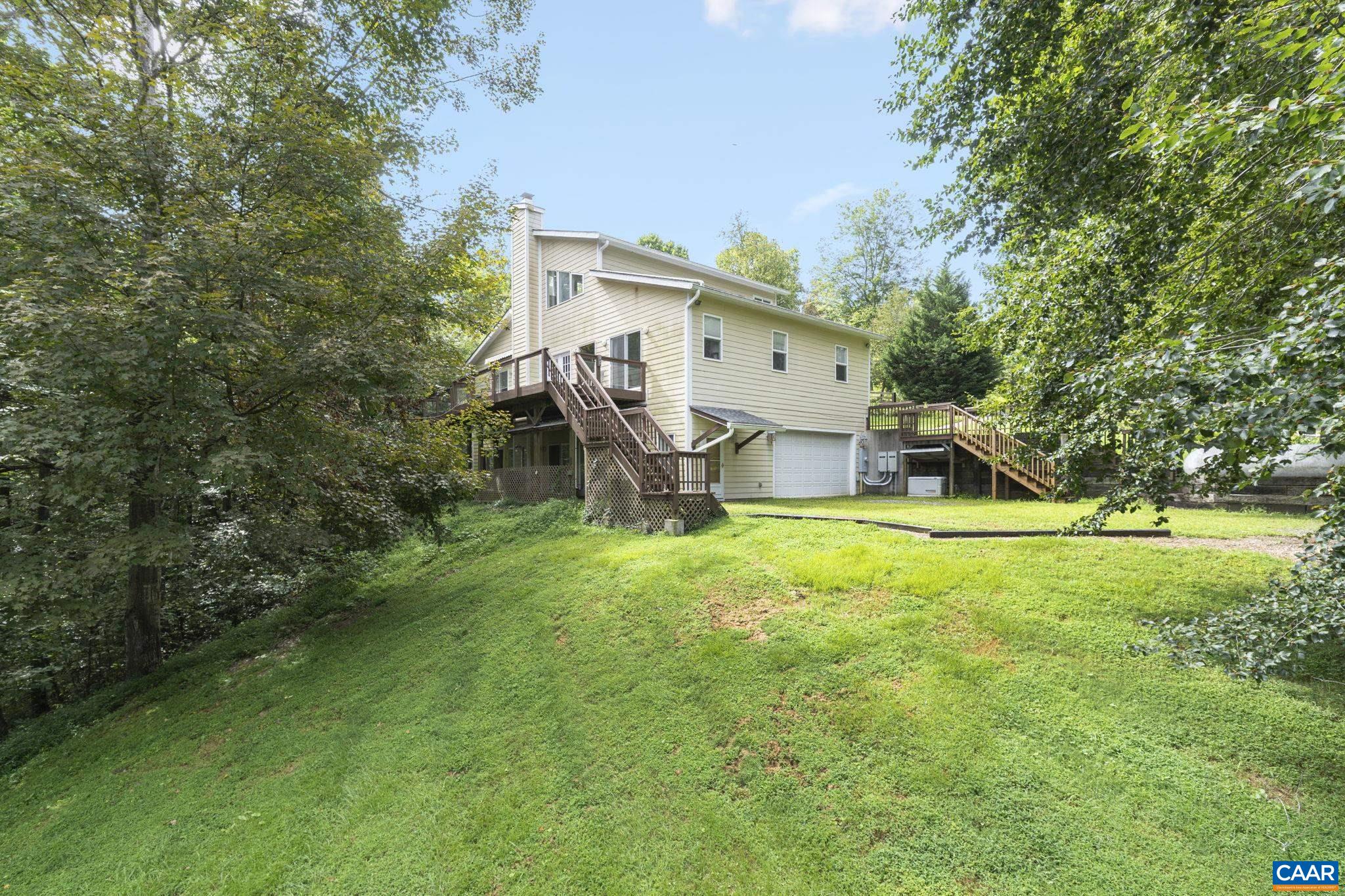 62 Summit Court Roseland, VA 22967 - Photo 47 of 75 a view of a house with backyard and a tree