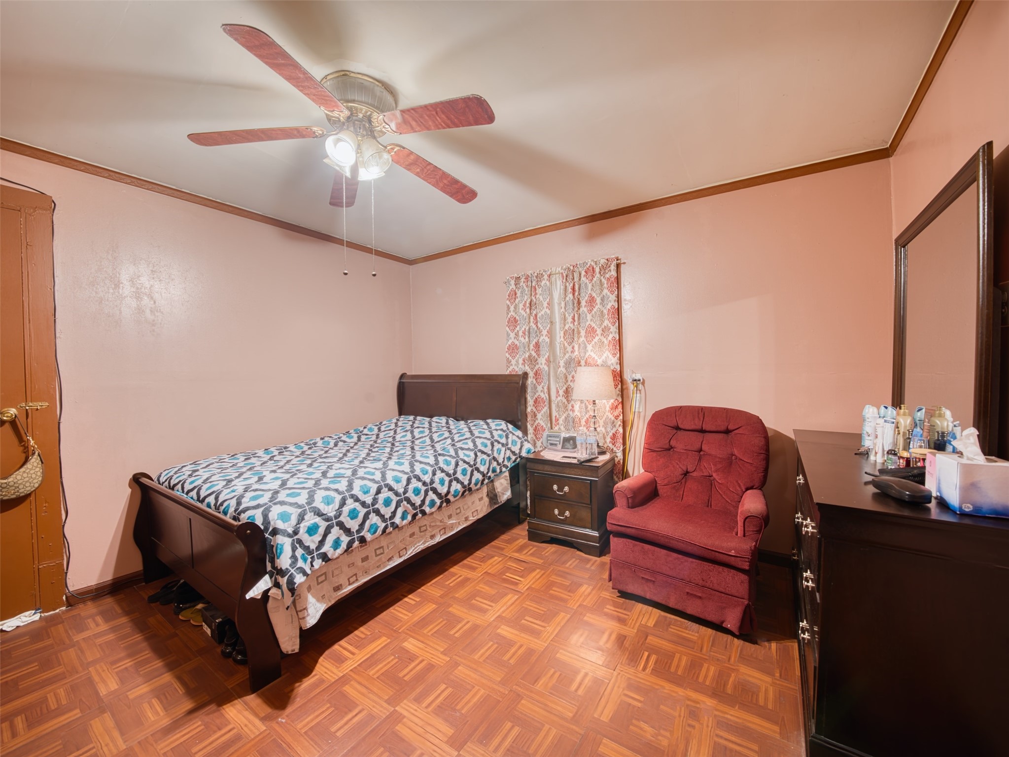 2900 Castro Street Austin, TX 78702 - Photo 24 of 39 Bedroom featuring ceiling fan and parquet floors