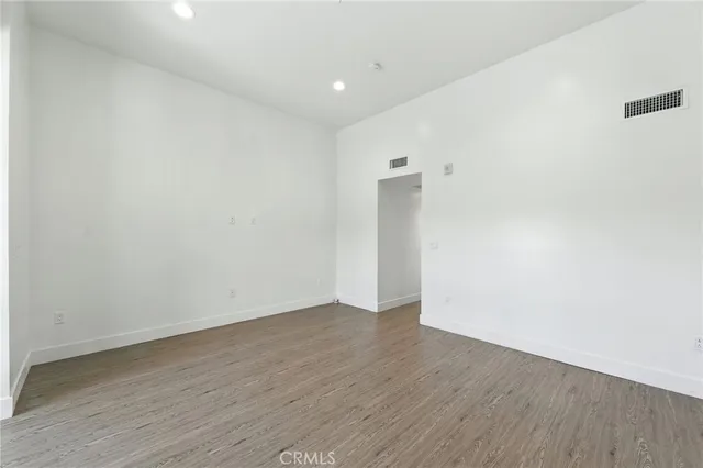 a bathroom with a sink a mirror and a shower