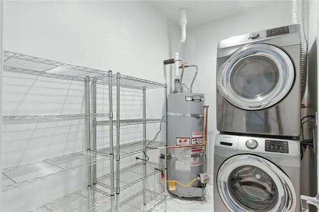 a view of a street with potted plants