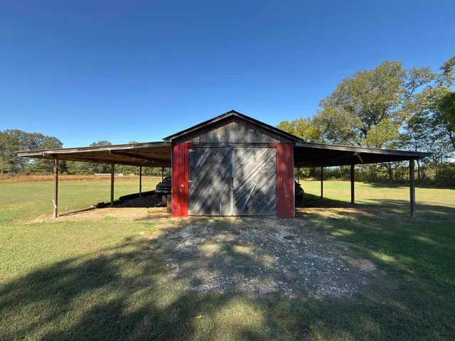 a view of swimming pool with an outdoor seating
