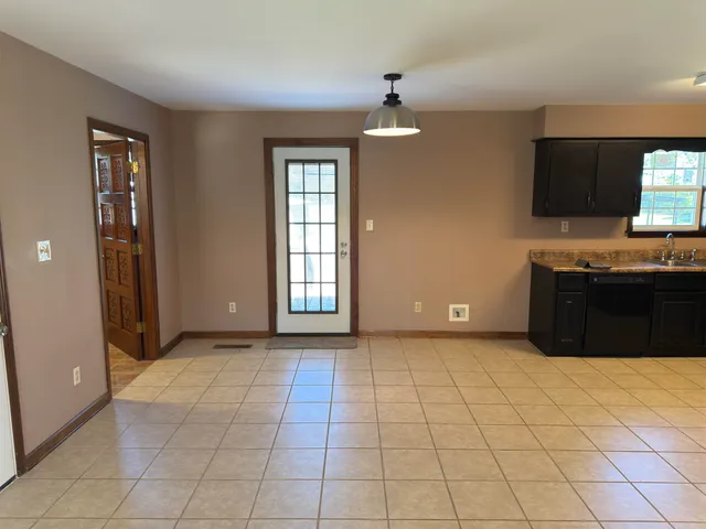 a view of kitchen with windows