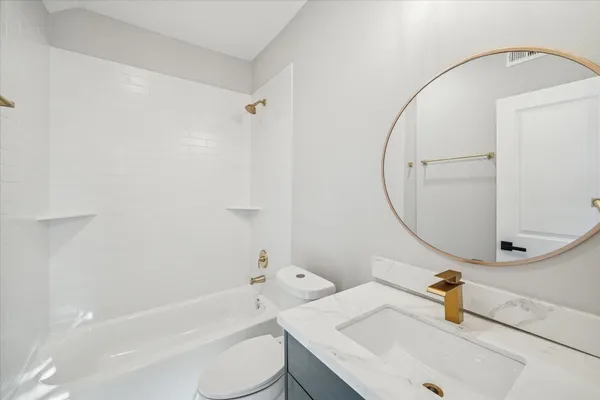 a bathroom with a sink and a window