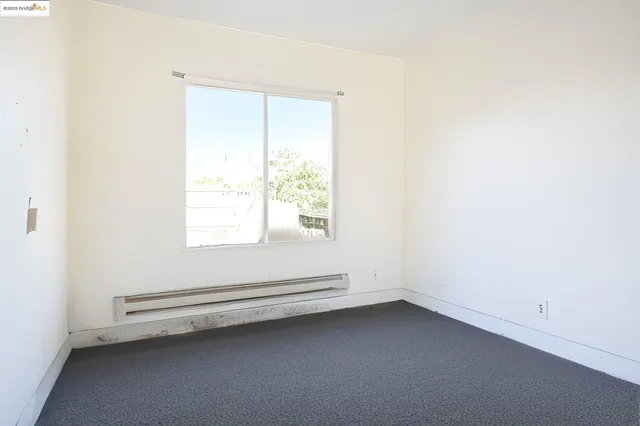 an empty room with closet