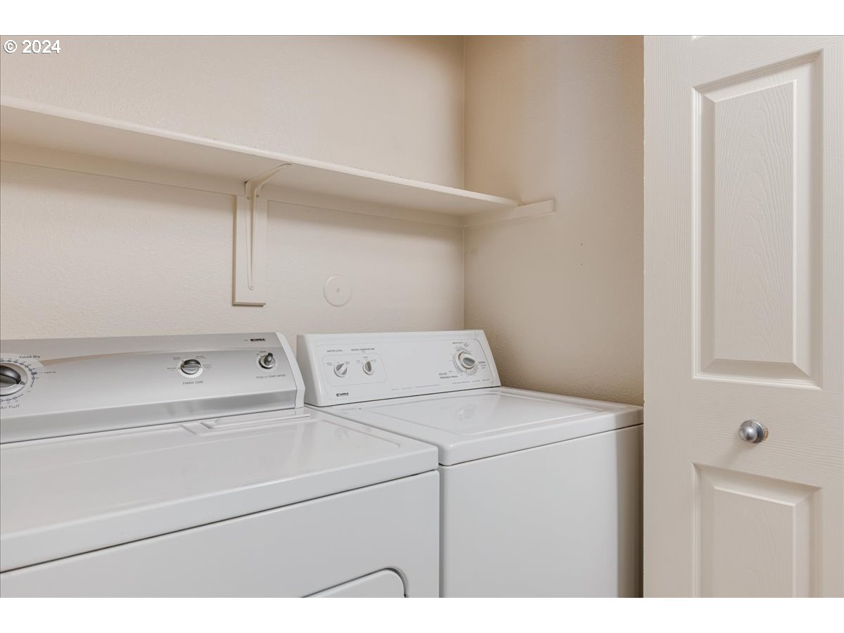 5225 Jean Road, Unit 313 Lake Oswego, OR 97035 - Photo 23 of 32 a utility room with dryer and washer
