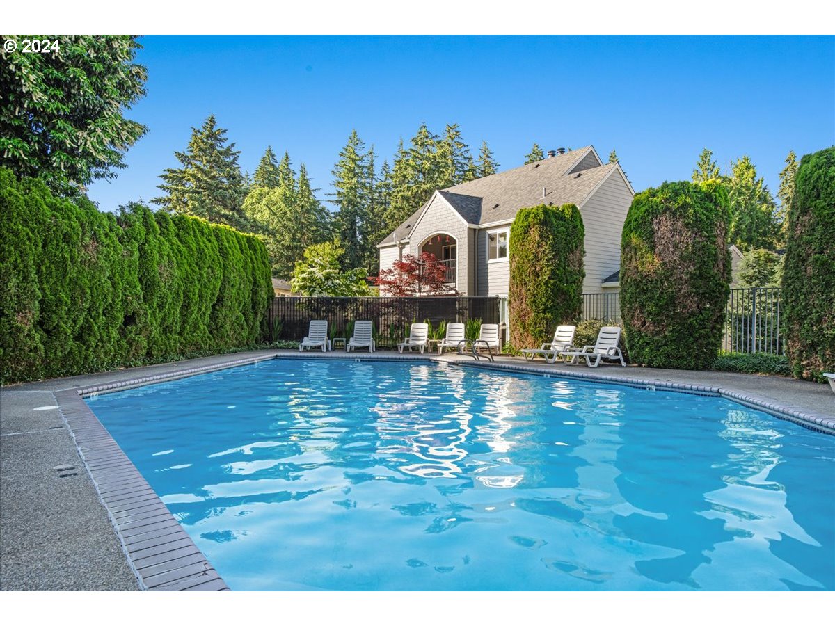 5225 Jean Road, Unit 313 Lake Oswego, OR 97035 - Photo 27 of 32 a view of a house with pool yard and a patio