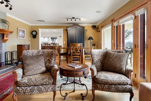 a bed room with a bed furniture and a large window