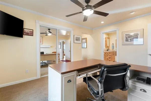 a bathroom with a sink a toilet and vanity