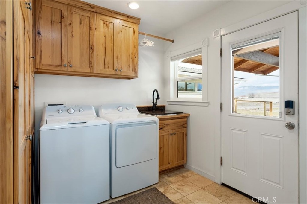 1201 Ball Mountain Little Shasta Road Montague, CA 96064 - Photo 29 of 46 a utility room with dryer and washer