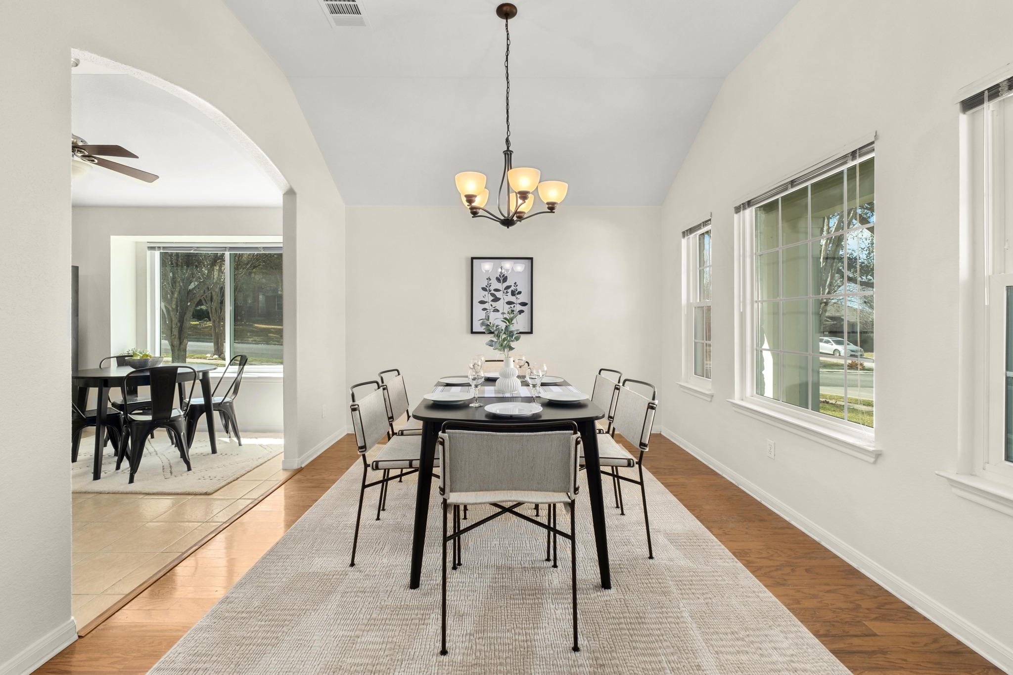 100 Pecanwood South Kyle, TX 78640 - Photo 11 of 35 Large enough for a full dining setup, this front-facing dining room offers flexibility for everyday meals, holiday gatherings, or long conversations around the table, all with convenient access to the kitchen just steps away