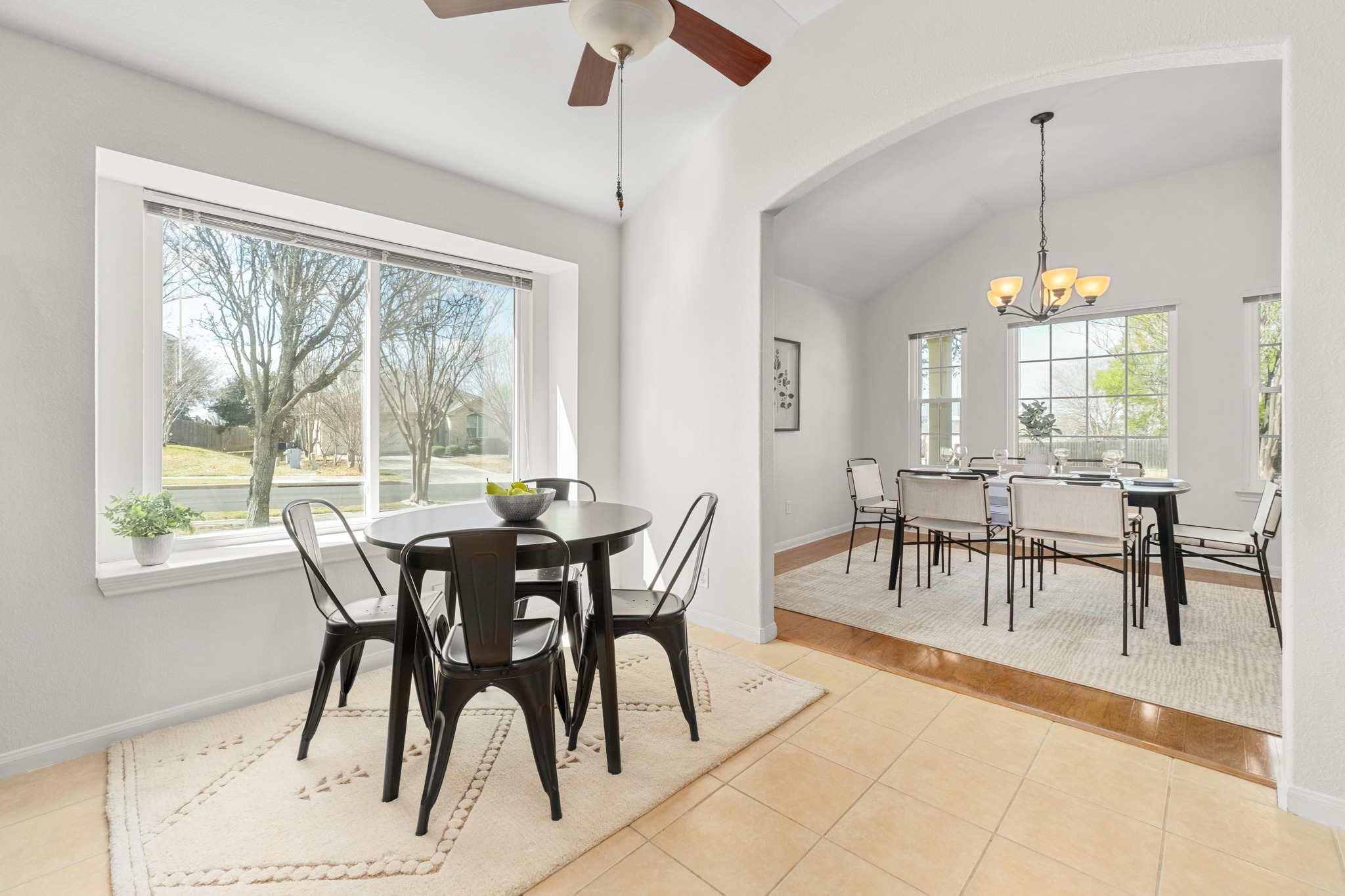 100 Pecanwood South Kyle, TX 78640 - Photo 16 of 35 The breakfast area sits inside the kitchen beside a large window, creating a bright spot for casual meals