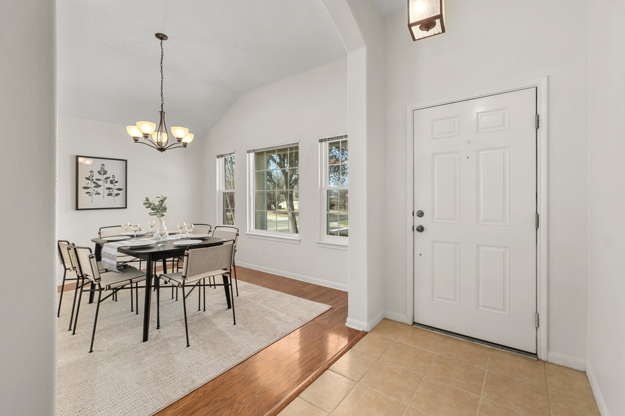 100 Pecanwood South Kyle, TX 78640 - Photo 10 of 35 Sitting at the front of the home, the dining room can easily transition into a dedicated office, study, or creative workspace depending on how the space is used day to day