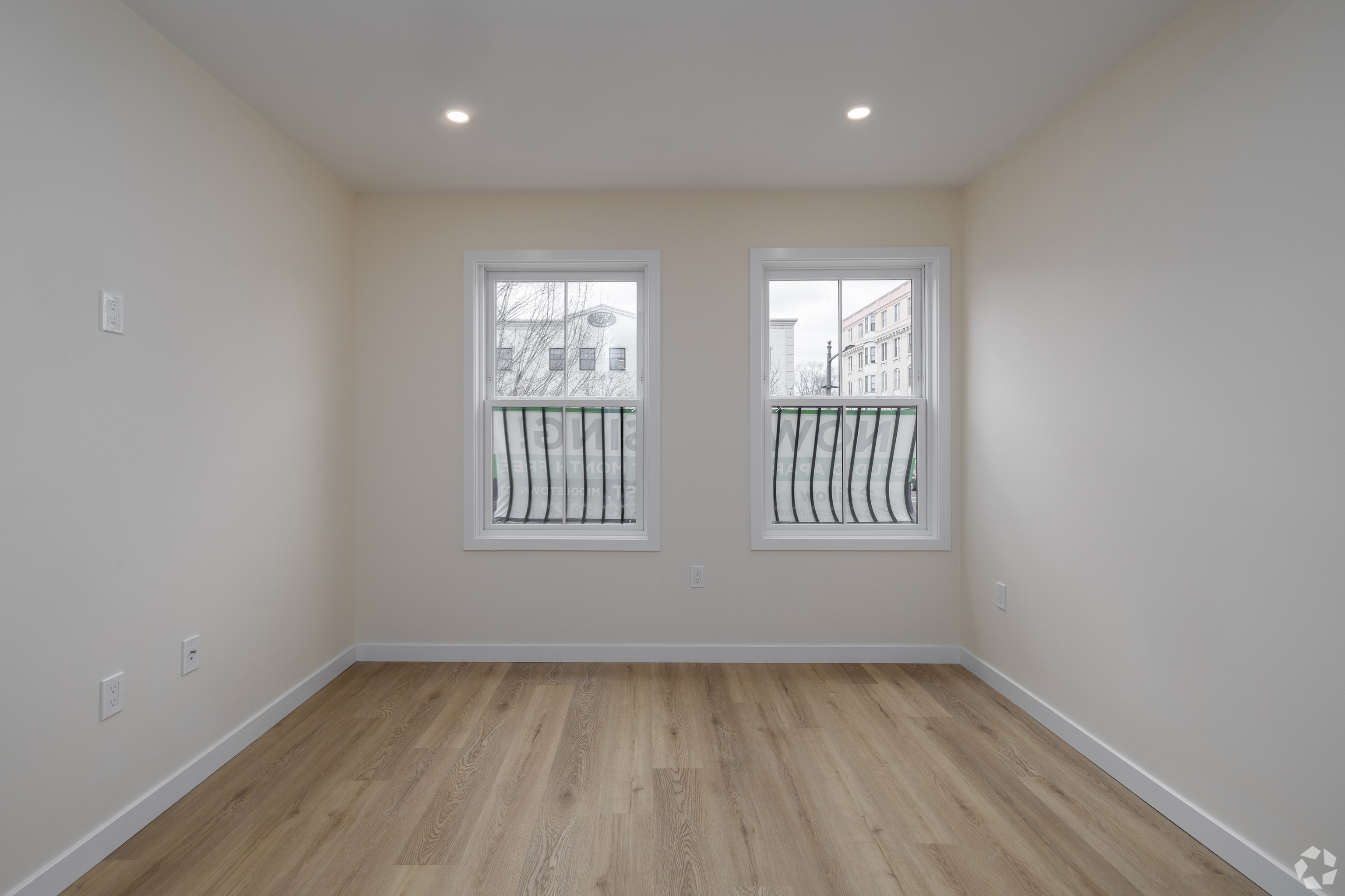 584 Main Street, Unit H Middletown, CT 06457 - Photo 3 of 10 wooden floor in an empty room with a window