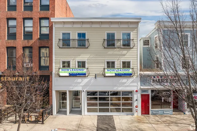 a front view of a multi story building