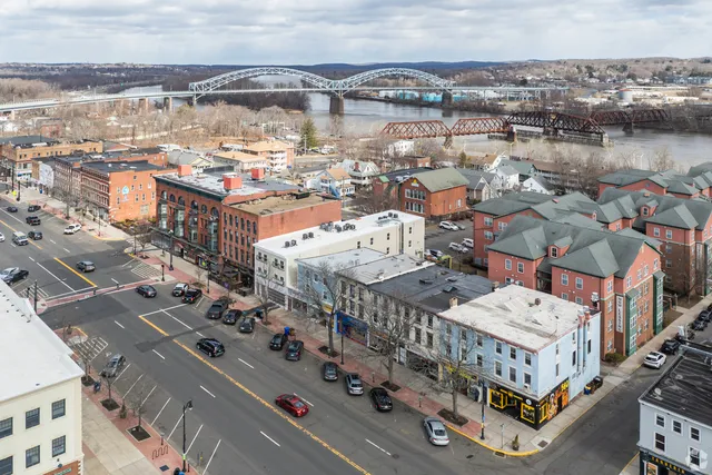 a view of city with ocean