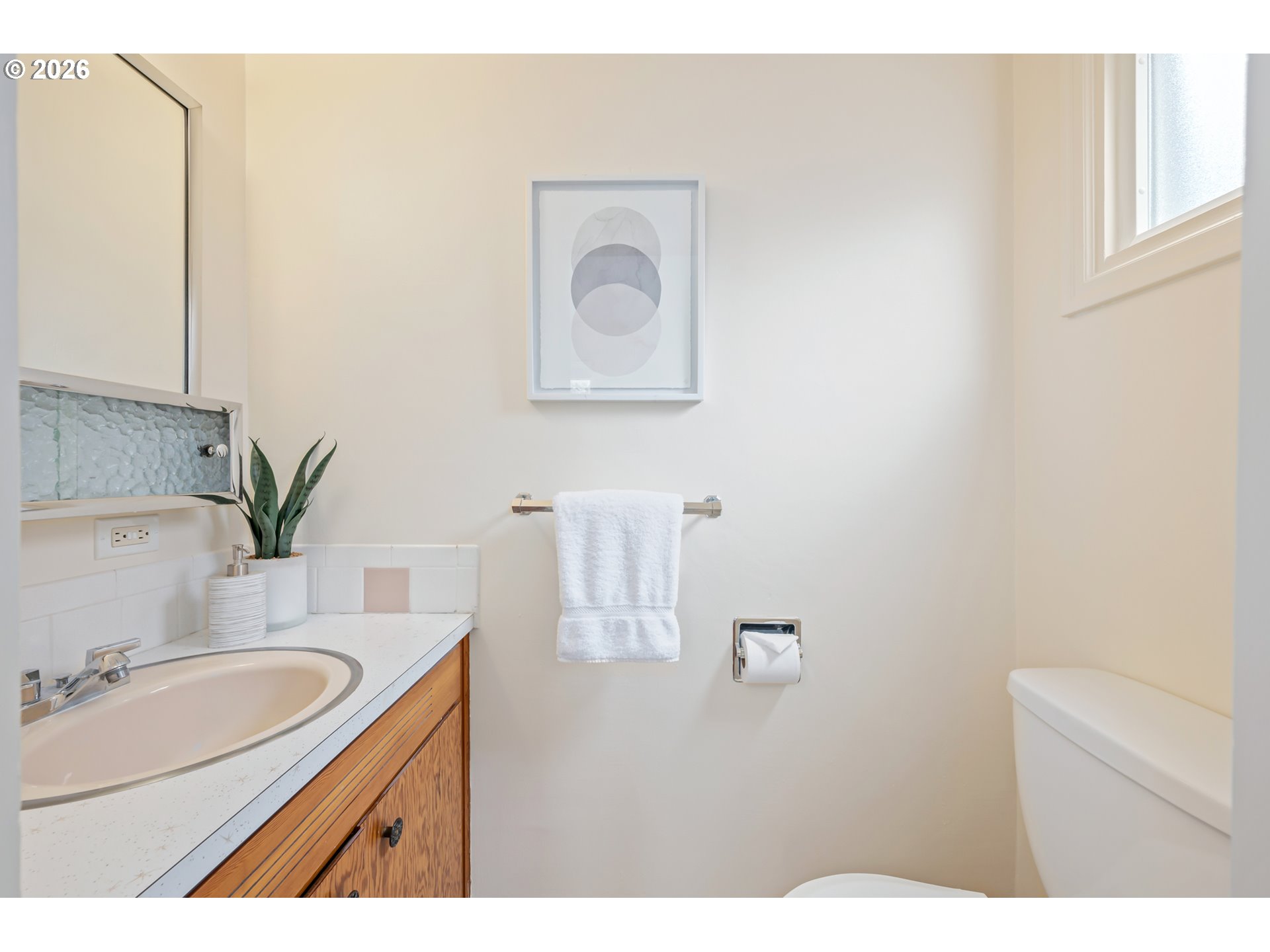2031 Olive Street Eugene, OR 97405 - Photo 17 of 38 a bathroom with a sink vanity granite and a mirror