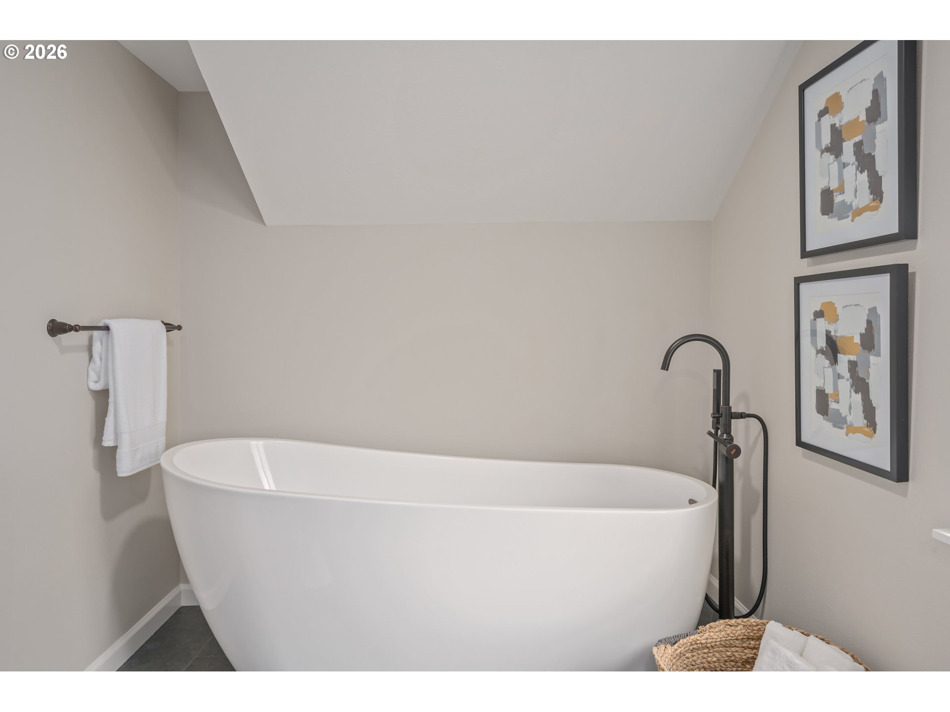 2031 Olive Street Eugene, OR 97405 - Photo 28 of 38 a white bath tub sitting in a bathroom
