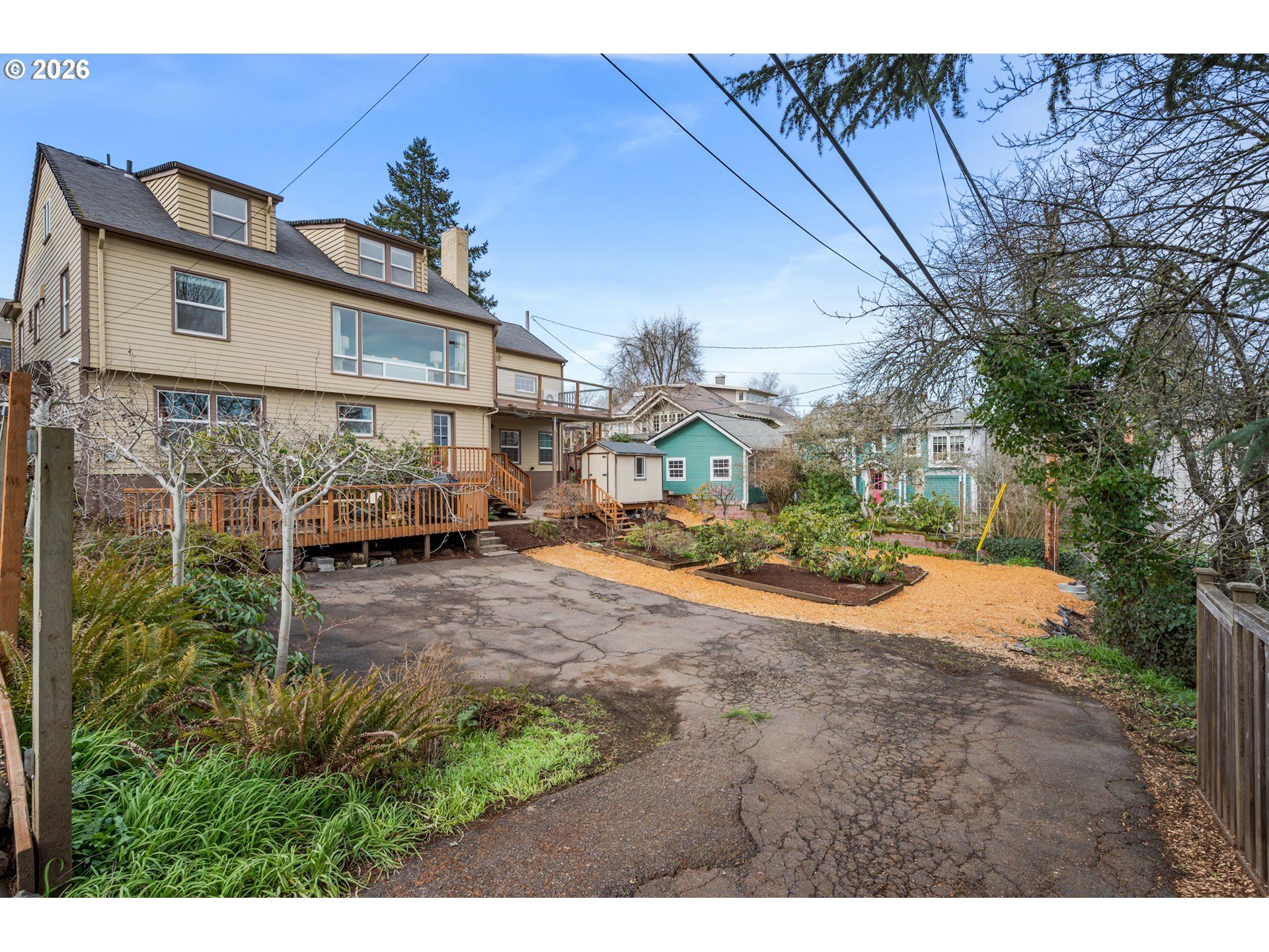 2031 Olive Street Eugene, OR 97405 - Photo 33 of 38 a view of a yard with cars
