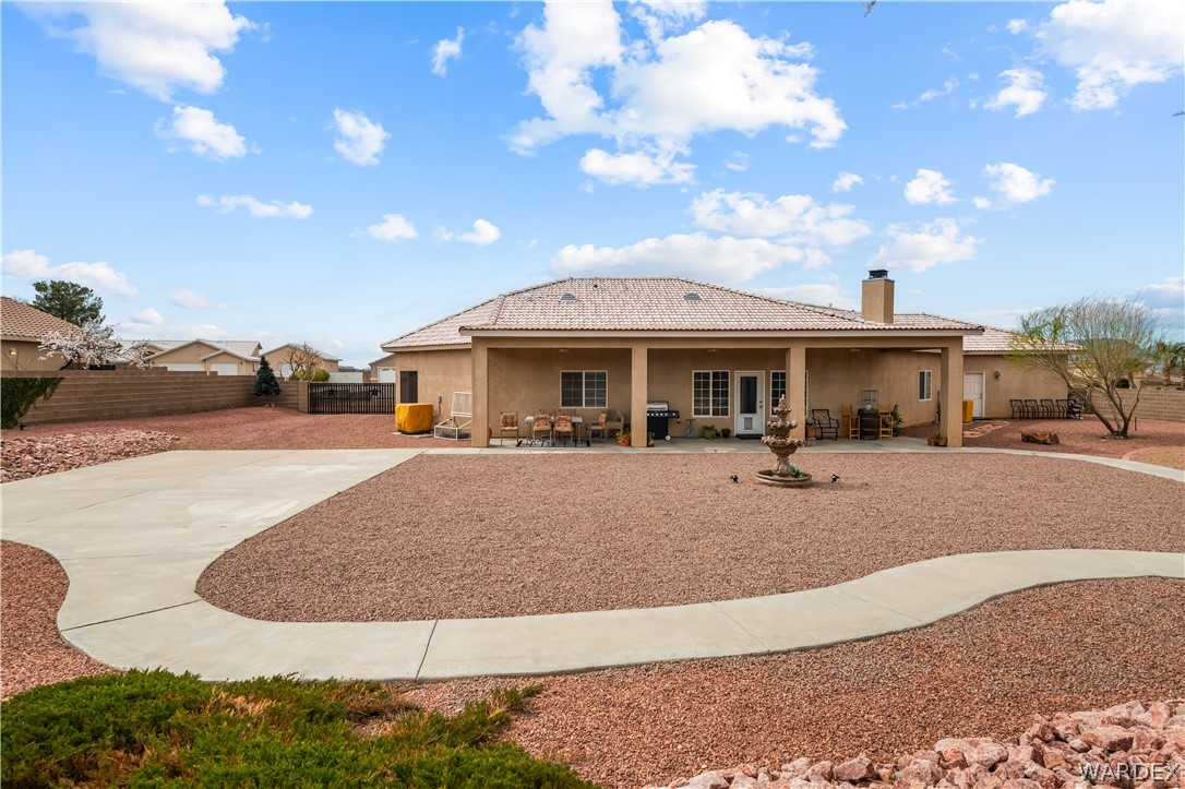 2898 Mountain Trail Road Kingman, AZ 86401 - Photo 49 of 75 a view of a house with a patio