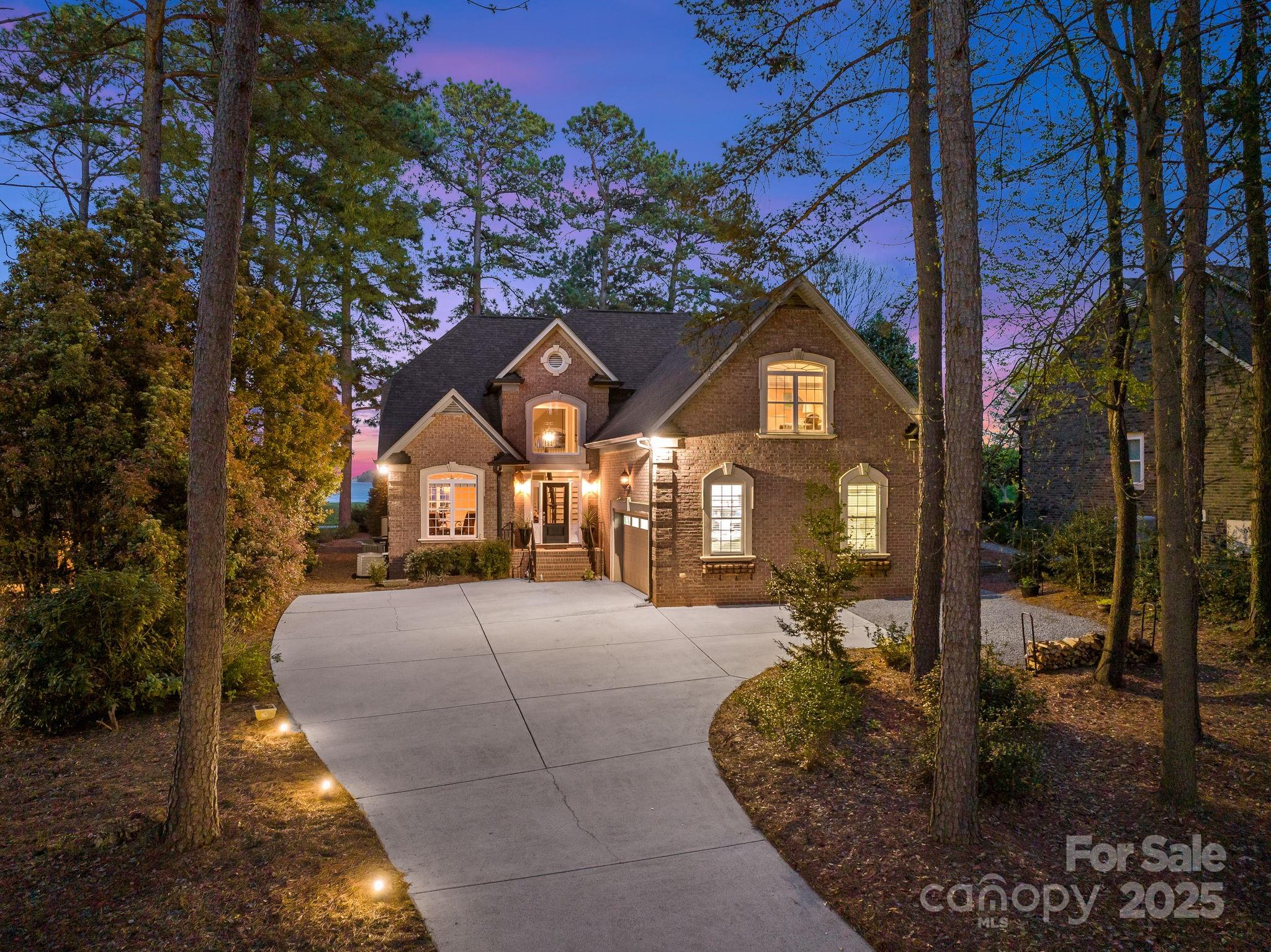 796 Lake Mist Drive Stanley, NC 28164 - Photo 2 of 43 a front view of a house with a yard