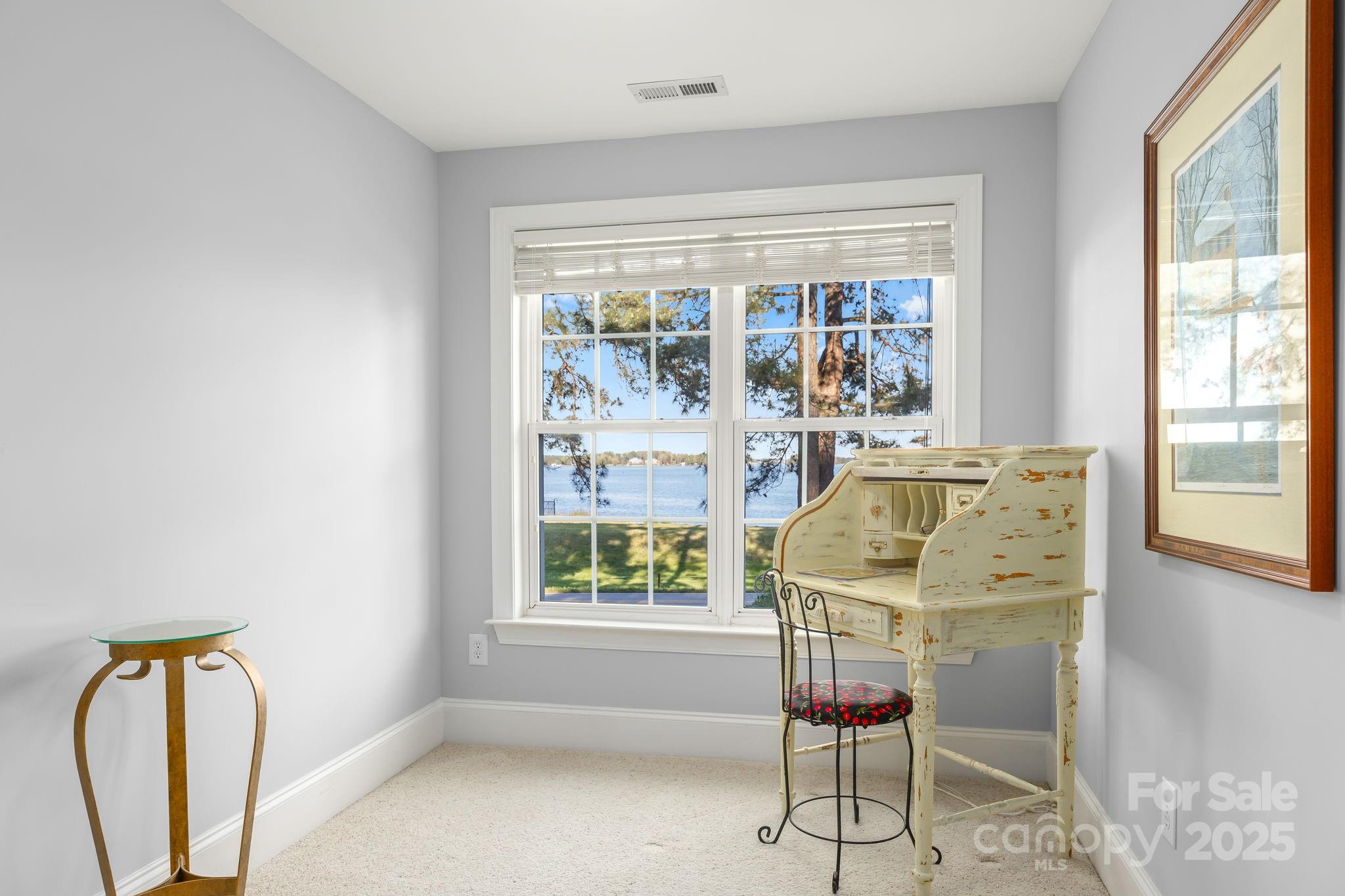 796 Lake Mist Drive Stanley, NC 28164 - Photo 27 of 43 a view of a dining room with furniture window and outside view