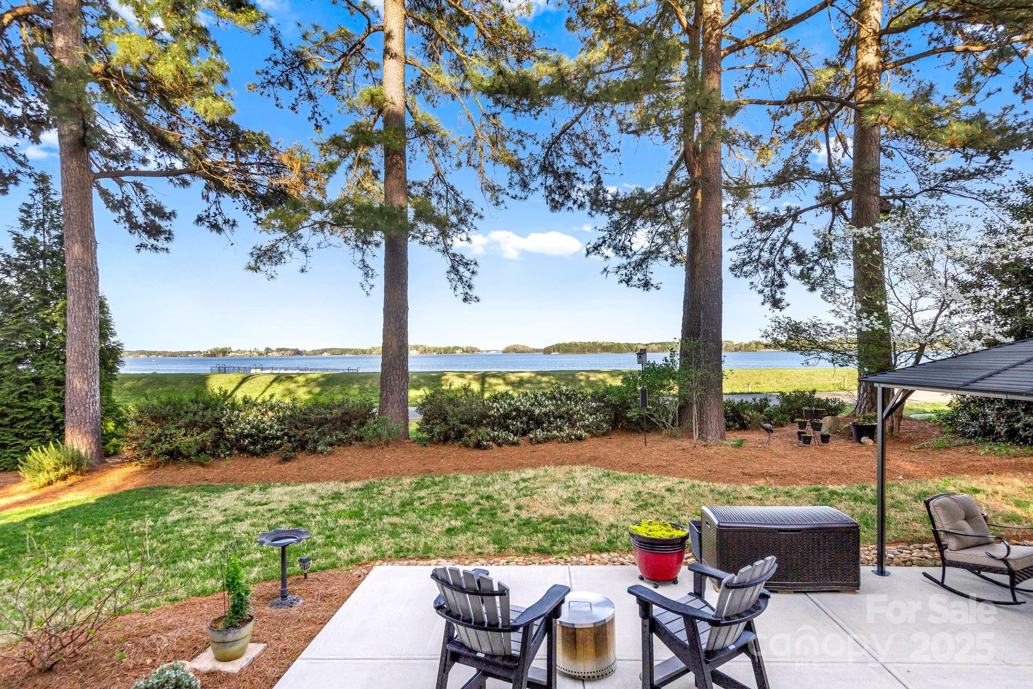 796 Lake Mist Drive Stanley, NC 28164 - Photo 34 of 43 a view of yard with seating area and green space